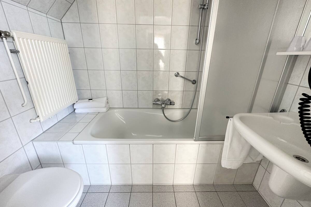 double loft, bathtub | bathroom | free toiletries, hair dryer, towels