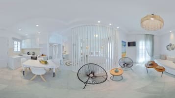 Grand Suite (Outdoor Jetted Tub) | Living area | 42-inch flat-screen TV with cable channels, TV