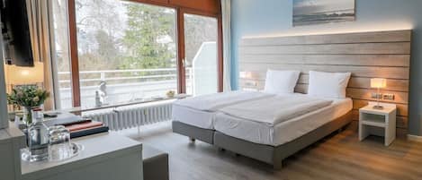 Comfort-Zimmer, Balkon | Zimmersafe, schallisolierte Zimmer, kostenloses WLAN, Bettwäsche