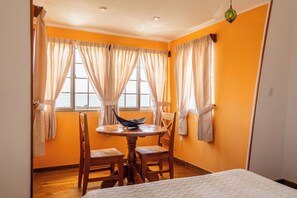 Superior Room | Living area | 48-inch flat-screen TV with cable channels, TV - El Faro del Colibri (Bocas del Toro)