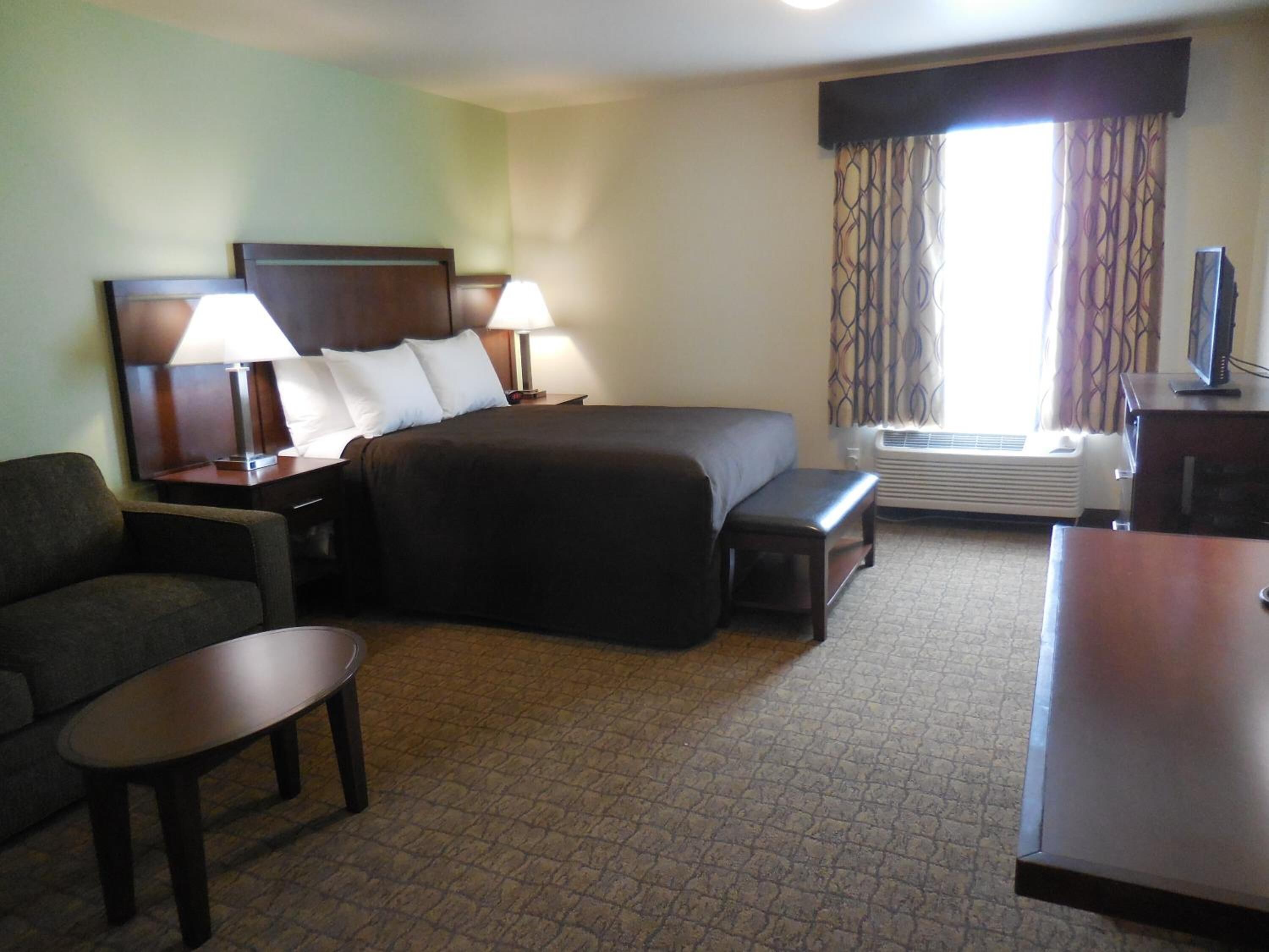 premium bedding, down duvets, desk, blackout curtains