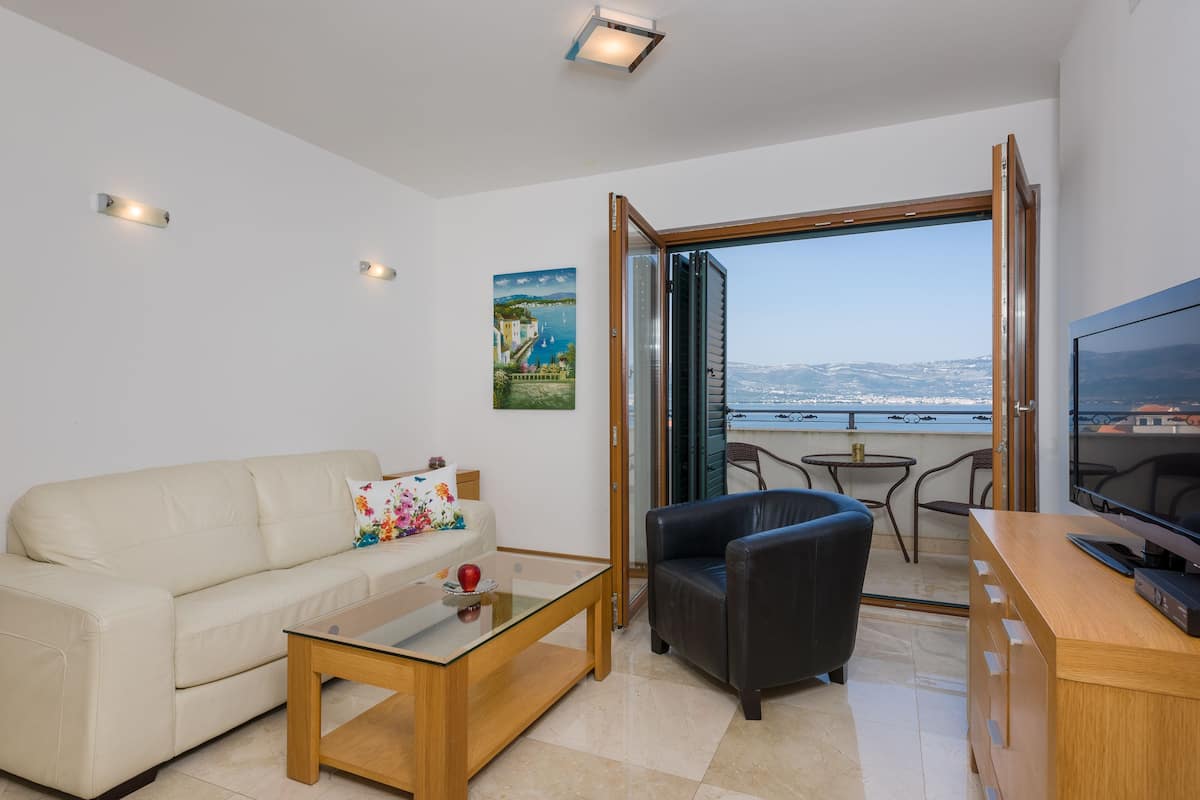 Family apartment(Apt 305), 1 bedroom, Balcony, Sea View | Living area | LCD TV