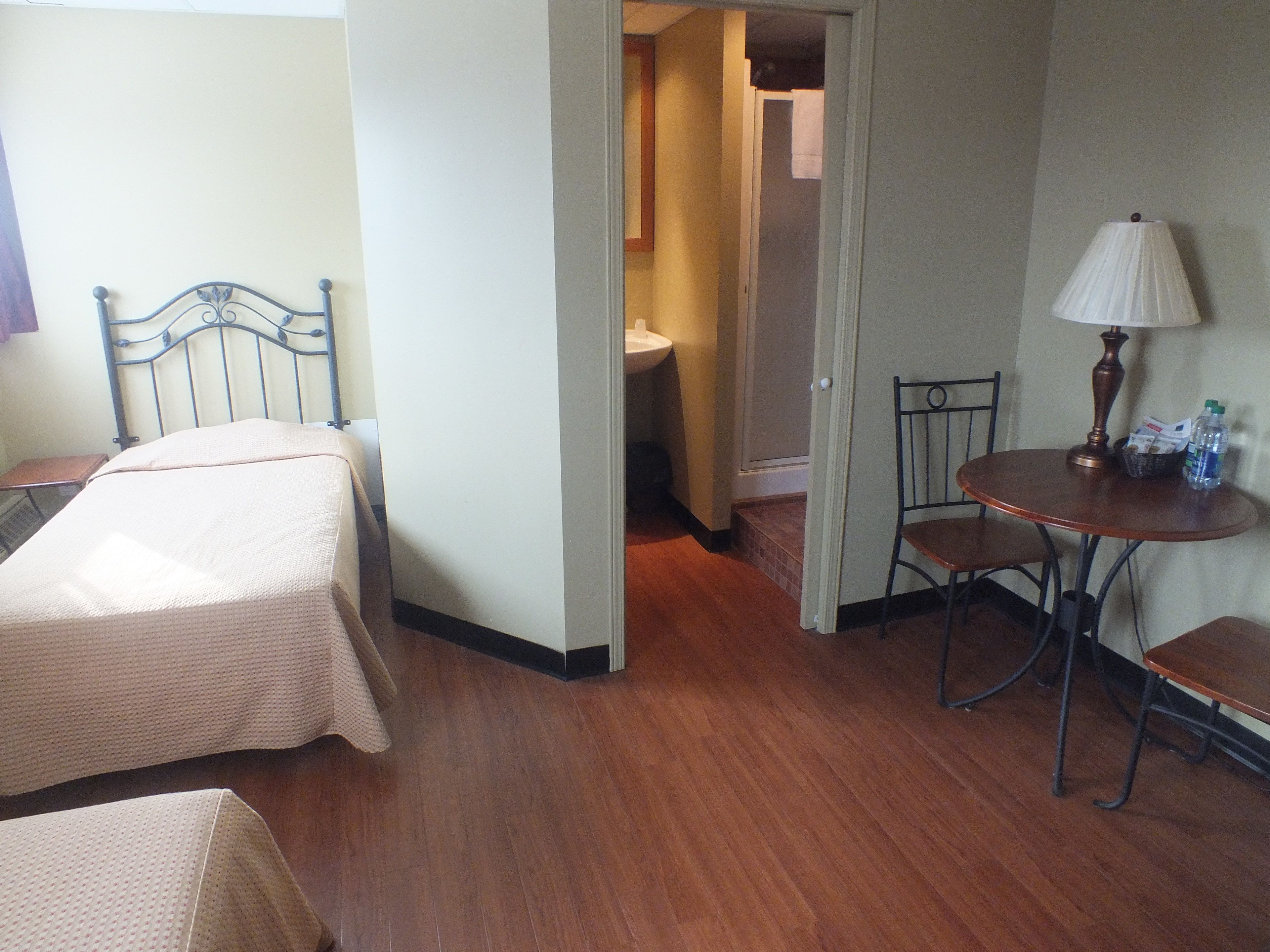 twin room, 2 single beds, private bathroom | living area