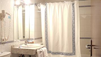 Bathtub, free toiletries, hair dryer, towels