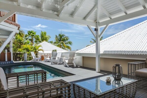 2 outdoor pools, pool umbrellas, pool loungers