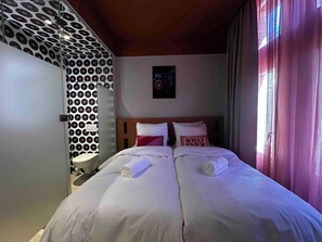 Premium bedding, in-room safe, desk, free WiFi