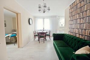 Superior Apartment, 1 Bedroom | Living room | Flat-screen TV, pay movies