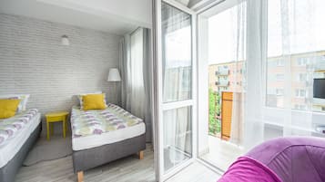 Standard Apartment, 1 Bedroom, Balcony | Living room | Flat-screen TV, pay films