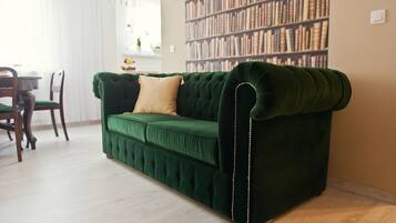 Superior Apartment, 1 Bedroom | Living room | Flat-screen TV, pay films