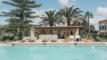 Seasonal outdoor pool, open 8:30 AM to 8:00 PM, sun loungers