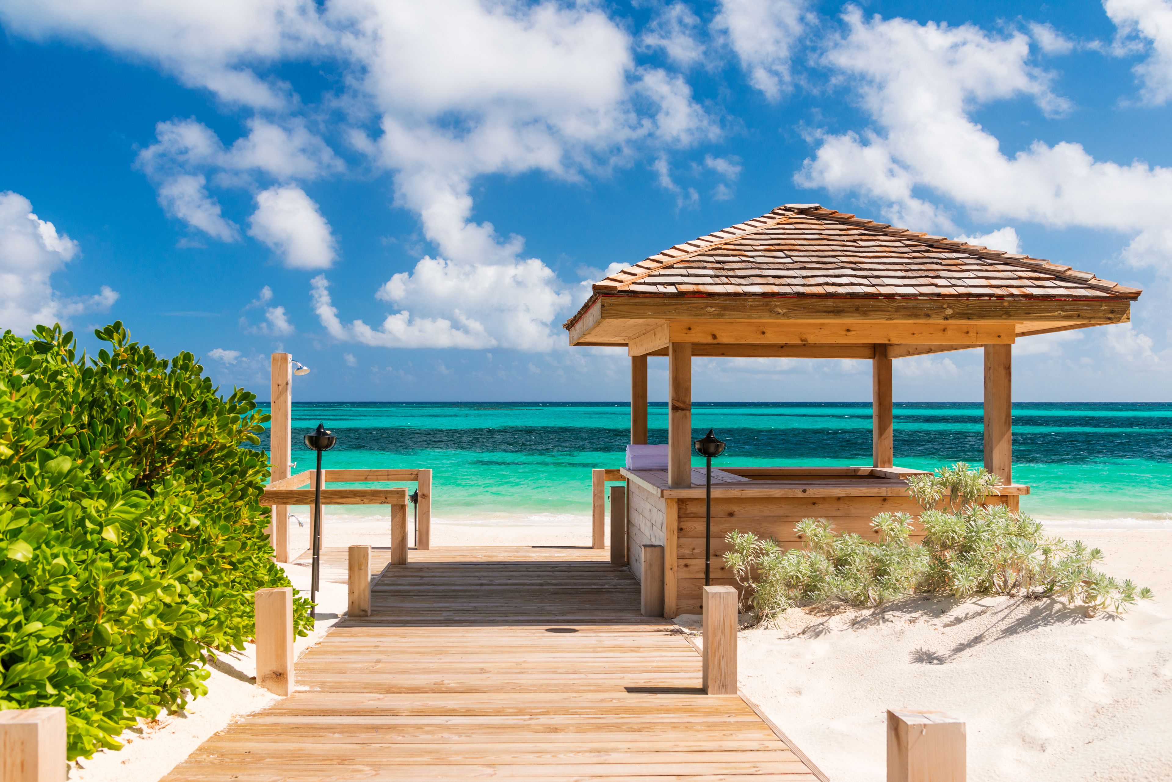 Private beach, white sand, free beach shuttle, sun-loungers