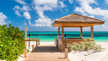 Private beach, white sand, free beach shuttle, sun-loungers