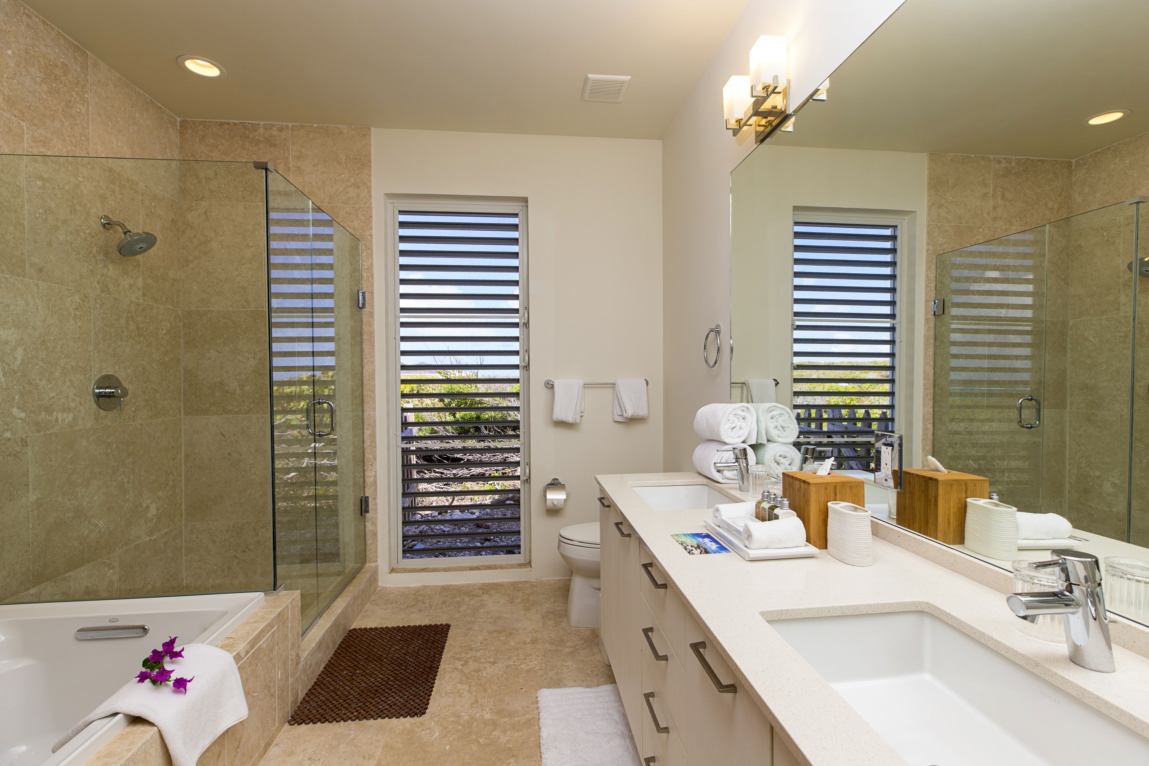 three bedroom peninsula oceanfront reef villa | bathroom | separate bathtub and shower, deep-soaking bathtub, designer toiletries