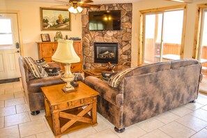 Bear's Den | Living room | Flat-screen TV, fireplace, DVD player - The Lodge at Duck Creek (Duck Creek Village)