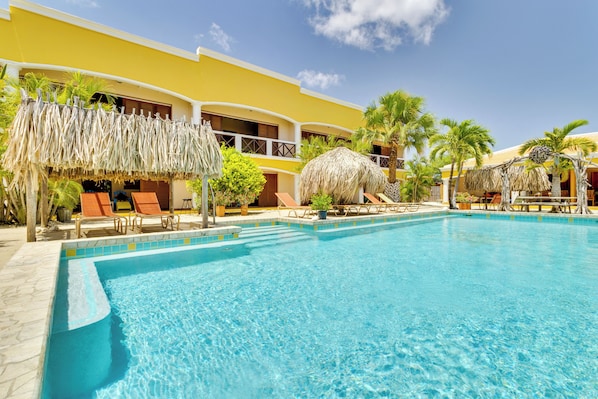 Outdoor pool, free pool cabanas, pool umbrellas