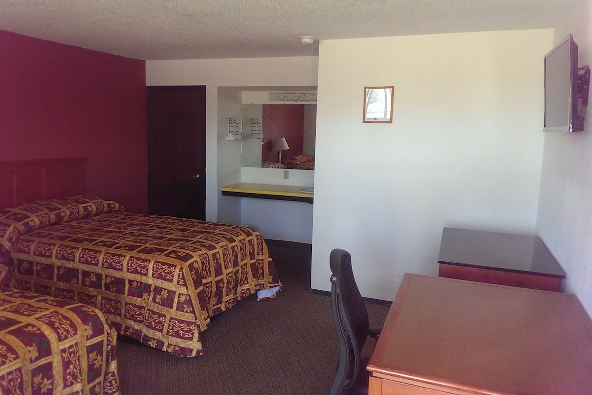 Desk, laptop workspace, free WiFi, bed sheets
