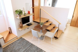 Studio | Living area | DVD player - No 49 - The Streets Apartments Barcelona (Barcelona)