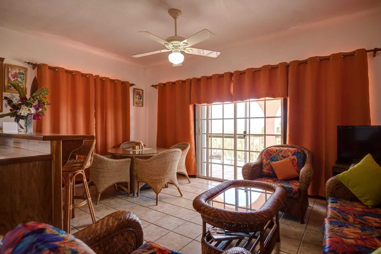 Apartment, 1 King Bed, Garden View | Living area | Flat-screen TV