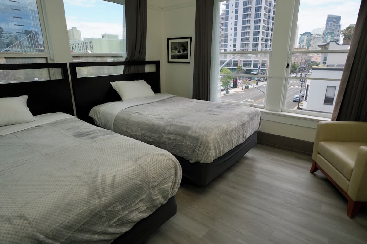 Deluxe Double Room, 2 Double Beds, Air conditioning, City View (Private Room) | Iron/ironing board, WiFi (free), bed sheets