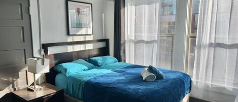 Habitació doble econòmica, bany compartit (Private Room) | Planxa i posts de planxar, wifi gratuïta i roba de llit