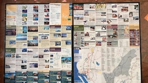 A travel guide with maps and photos of destinations.