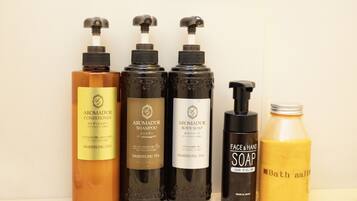 Four bottles of aromadour products and one bath salt bottle.