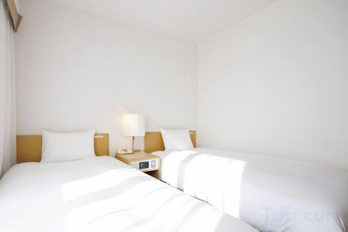 Desk, blackout curtains, iron/ironing board (on request), free WiFi