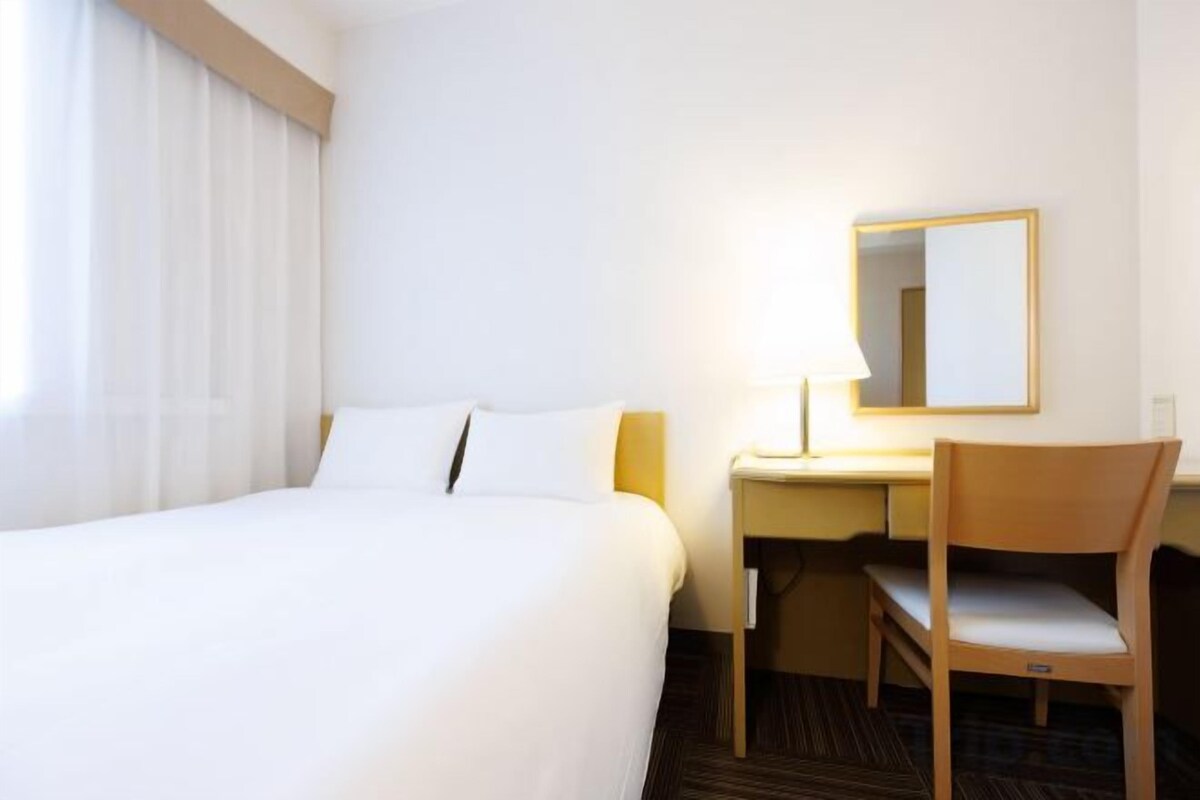 Desk, blackout curtains, iron/ironing board (on request), free WiFi