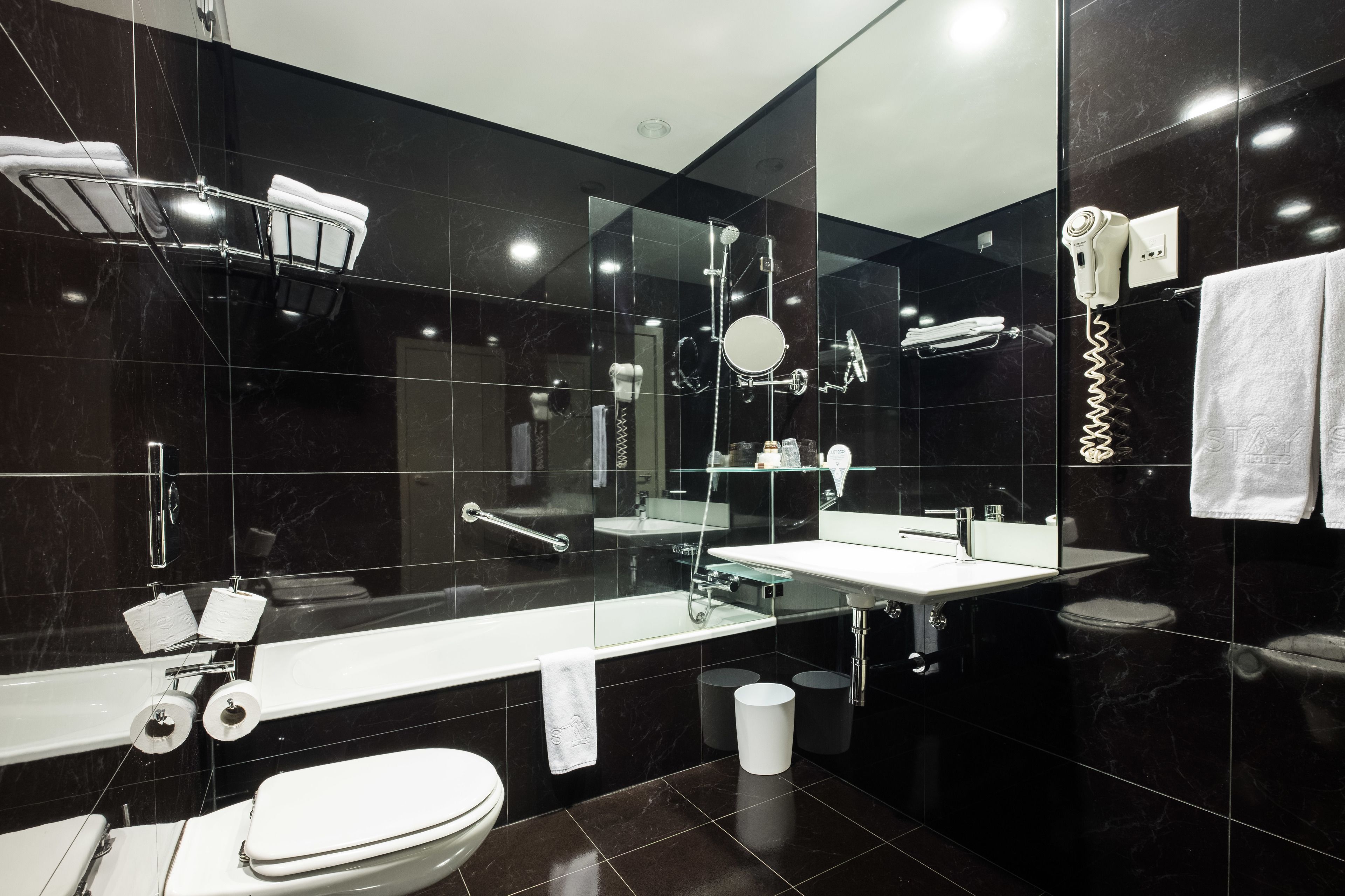 free toiletries, hair dryer, slippers, bidet