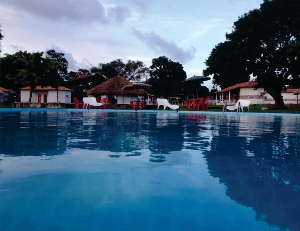 2 outdoor pools, pool umbrellas, pool loungers