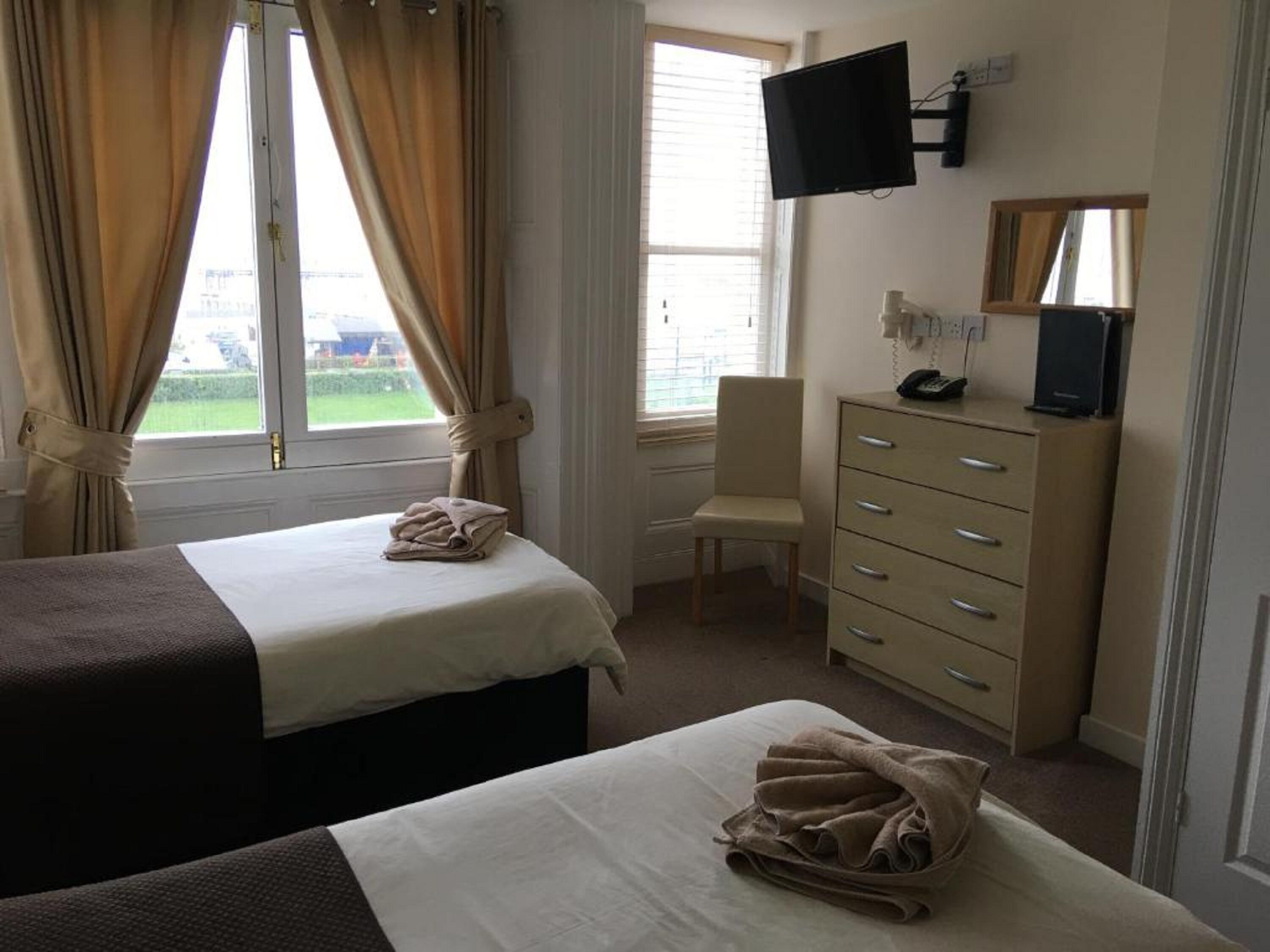 blackout curtains, iron/ironing board, free wifi, bed sheets