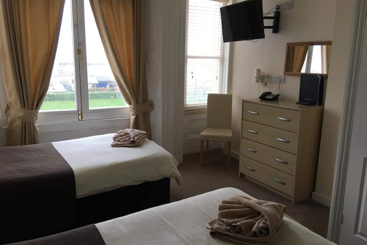 blackout curtains, iron/ironing board, free wifi, bed sheets