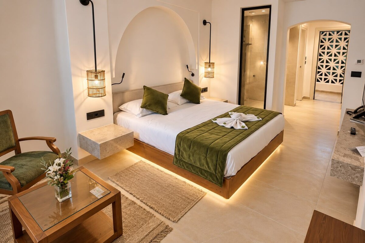 Deluxe Double Room, Beachfront | 1 bedroom, desk, blackout drapes, individually furnished