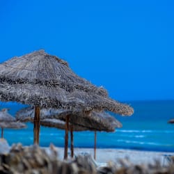 Private beach, beach umbrellas, beach towels