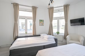 Quadruple Room | Desk, blackout drapes, free WiFi, bed sheets