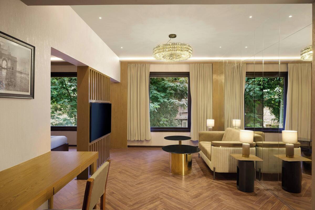 Suite, 1 King Bed, City View | Living room | Flat-screen TV