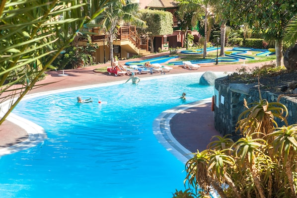 Outdoor pool, pool umbrellas, pool loungers