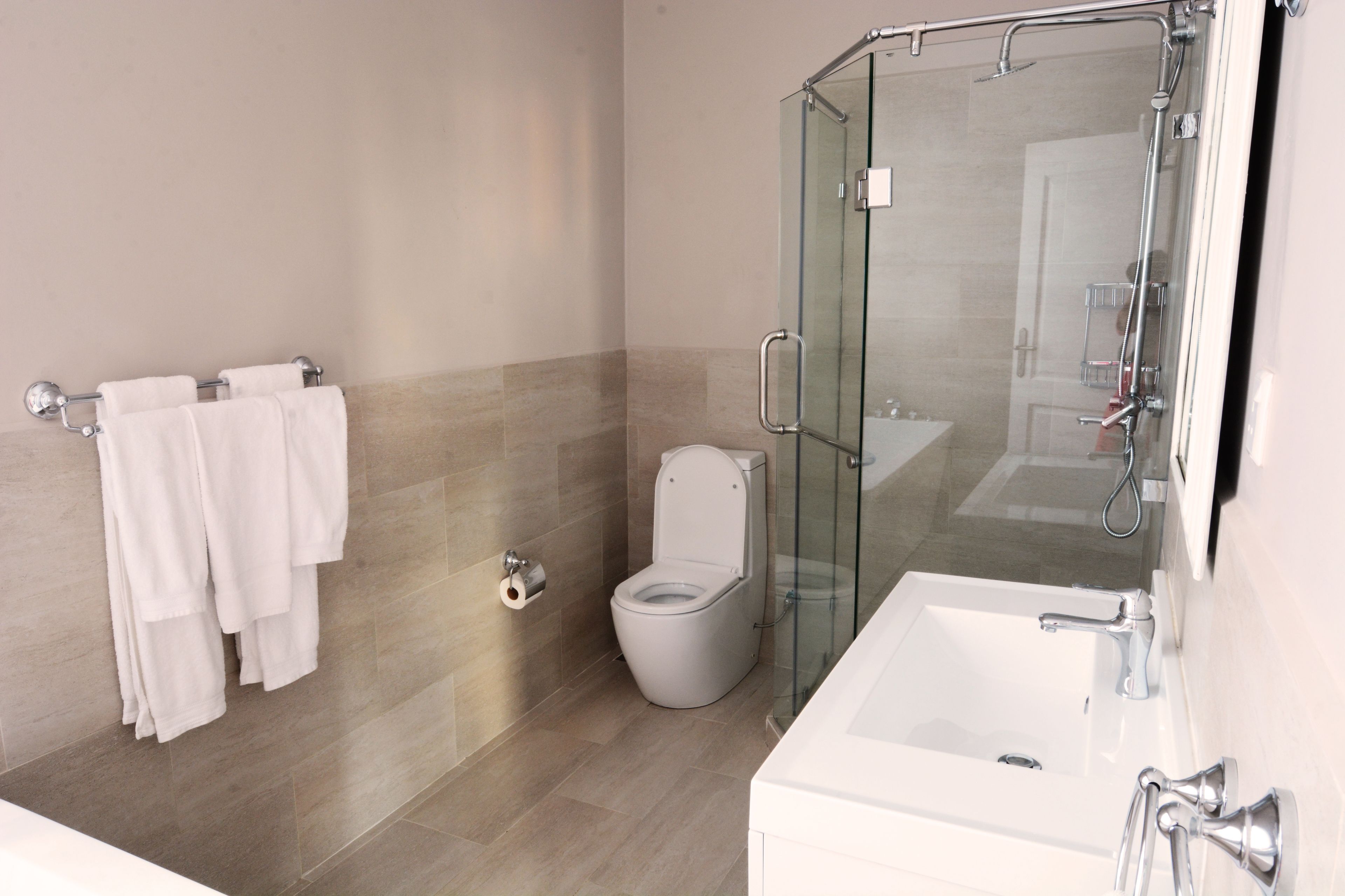 separate bathtub and shower, free toiletries, hair dryer, bathrobes