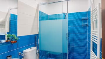 Shower, free toiletries, hair dryer, towels