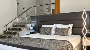 Ropa de cama de alta calidad y minibar