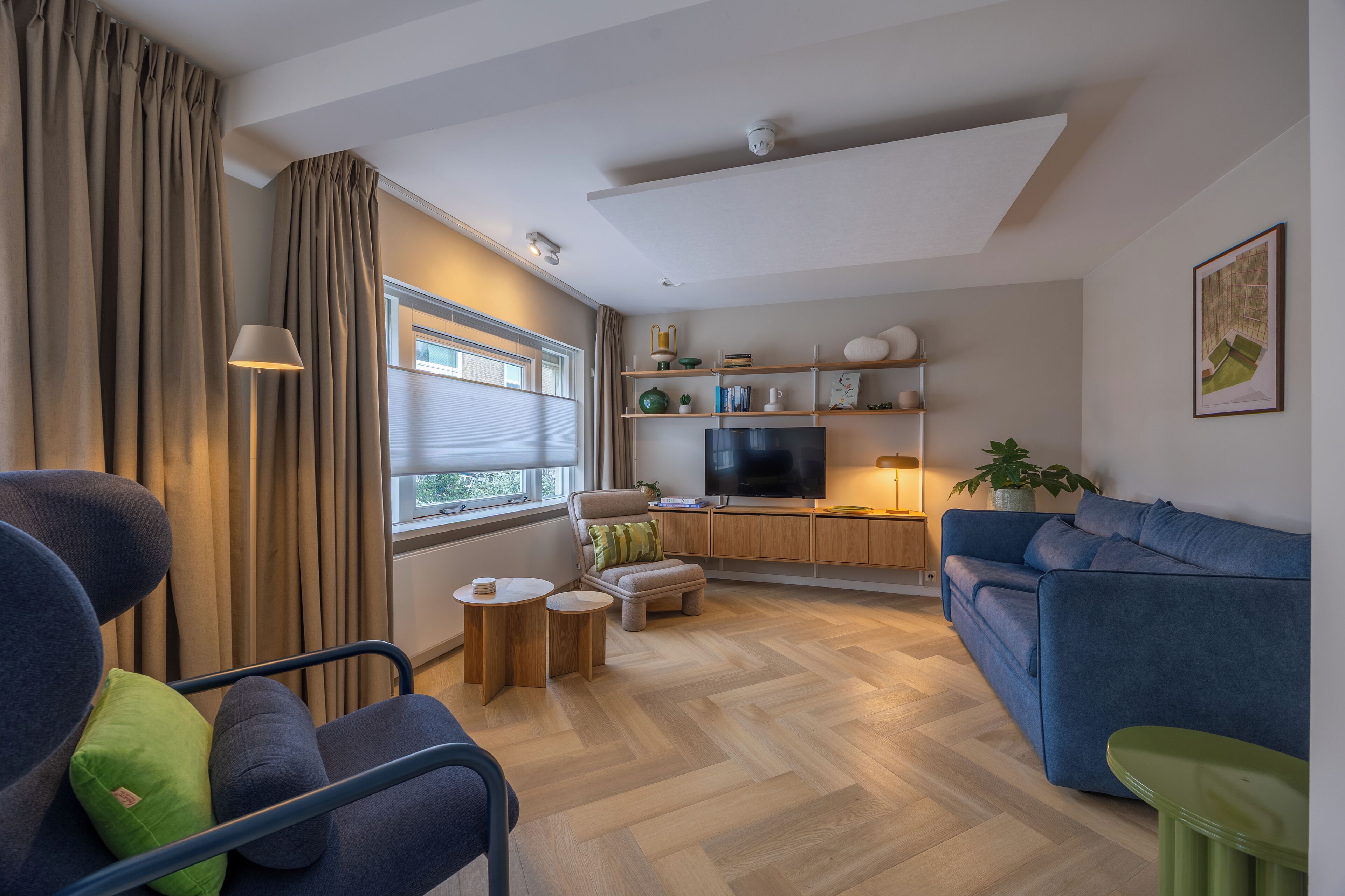 Deluxe-Apartment | Wohnbereich | Flachbildfernseher