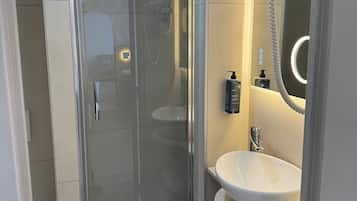Shower, free toiletries, hair dryer, towels