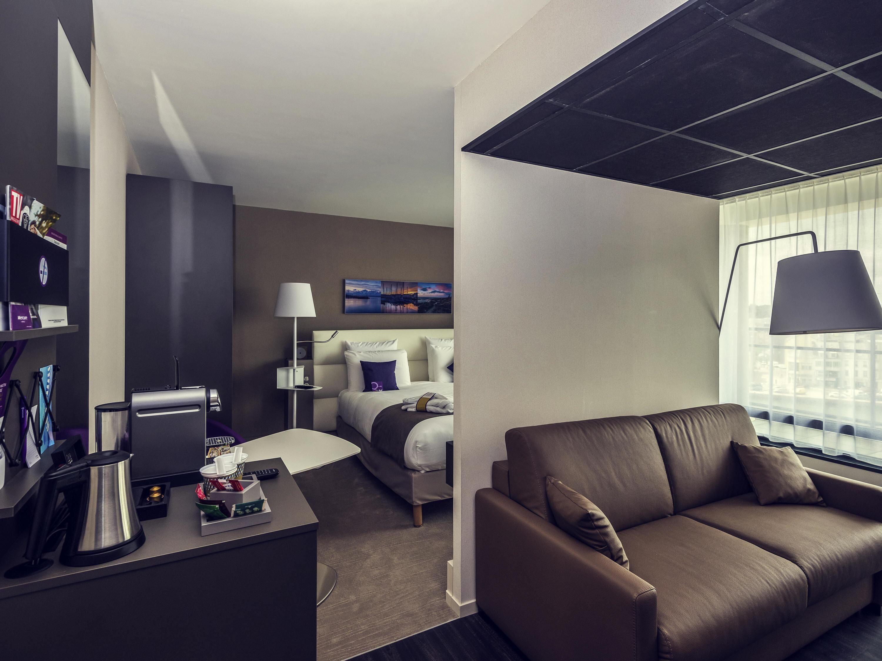 Suite, 1 Doppelbett und Schlafsofa, Balkon | Minibar, Zimmersafe, Schreibtisch, schallisolierte Zimmer