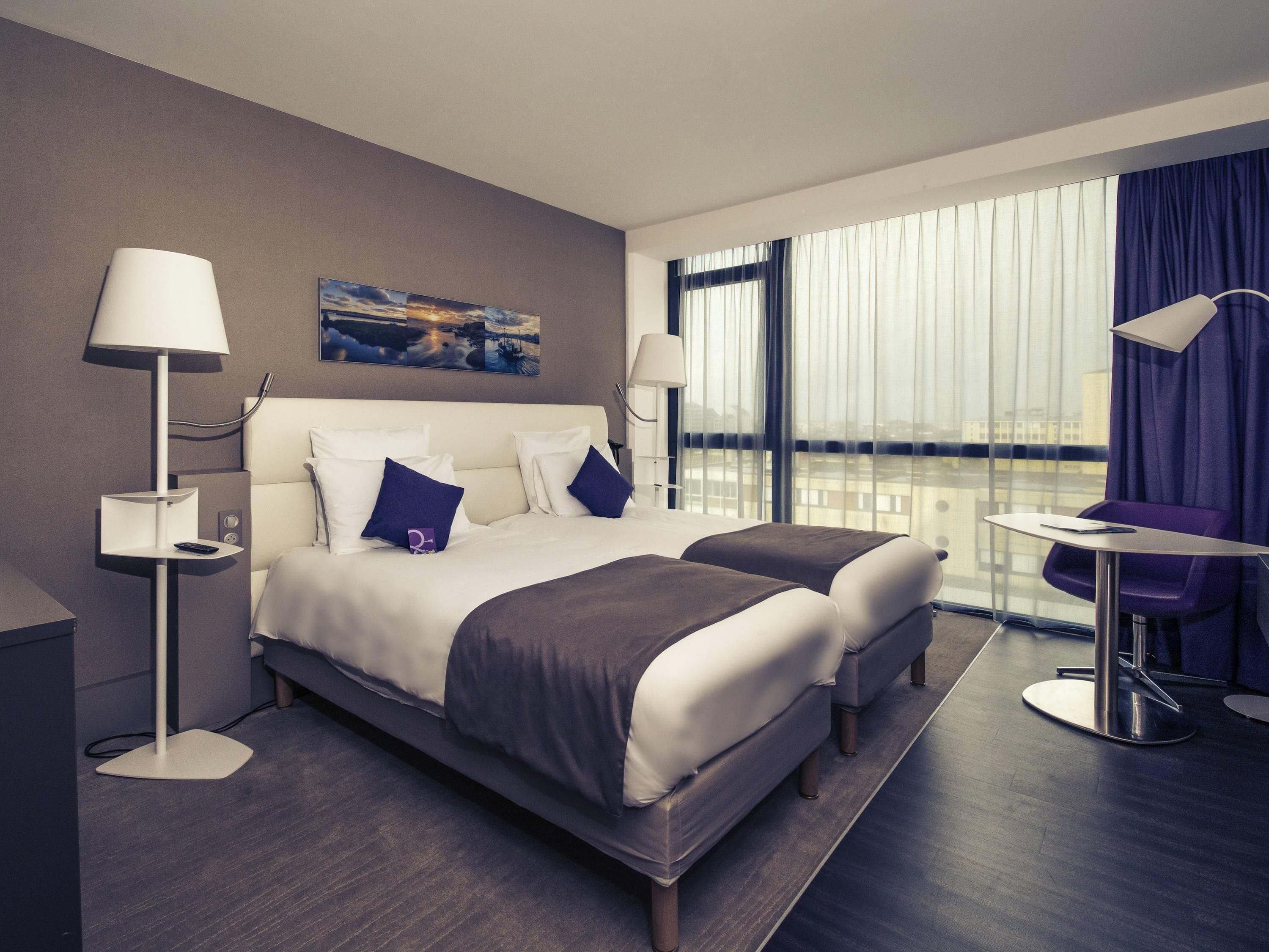 Klassieke Twin kamer, 2 eenpersoonsbedden | Een minibar, een kluis op de kamer, een bureau, geluiddichte muren