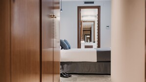 Premium bedding, down comforters, in-room safe, desk