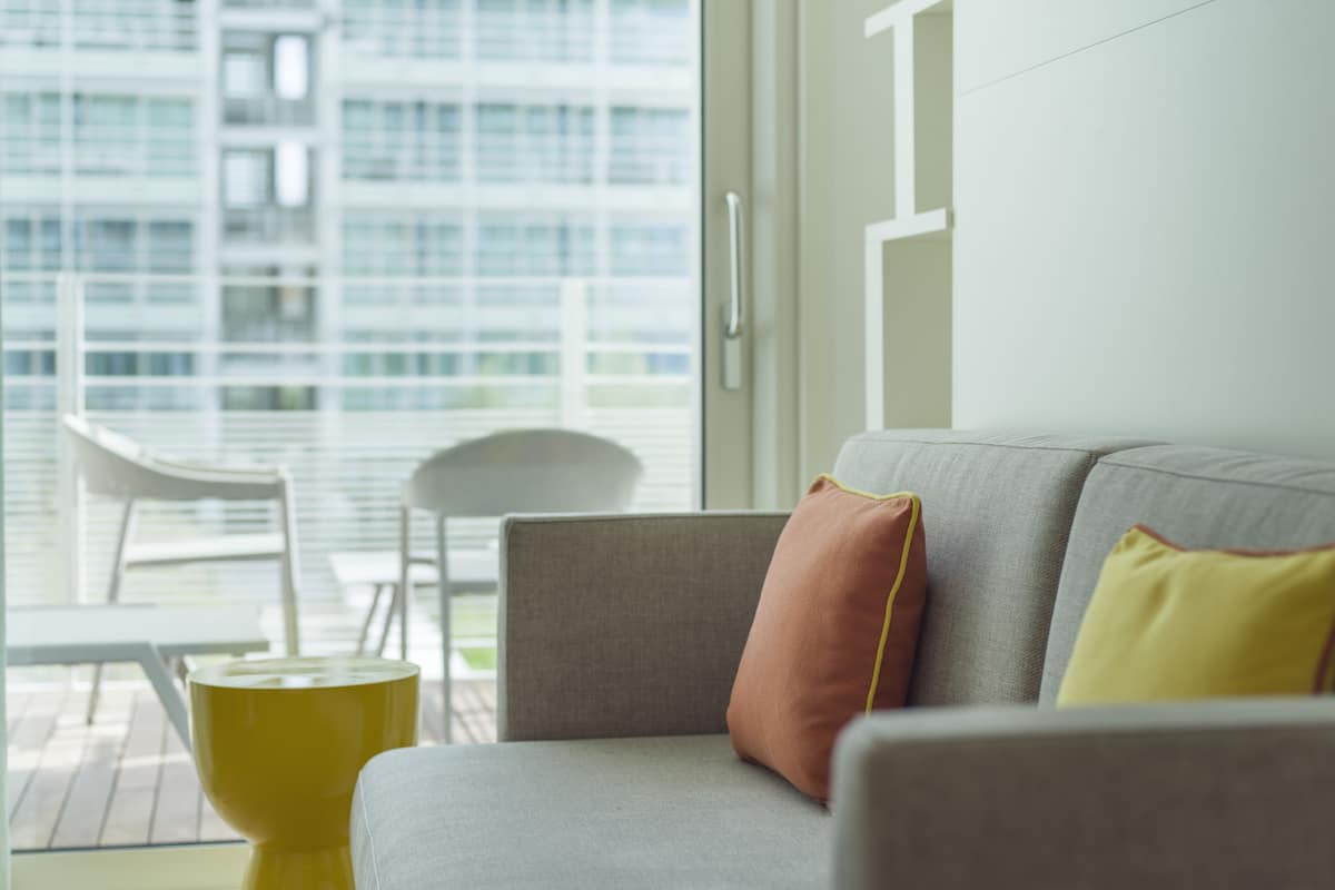 comfort suite, balcony, partial sea view | premium bedding, minibar, in-room safe, desk