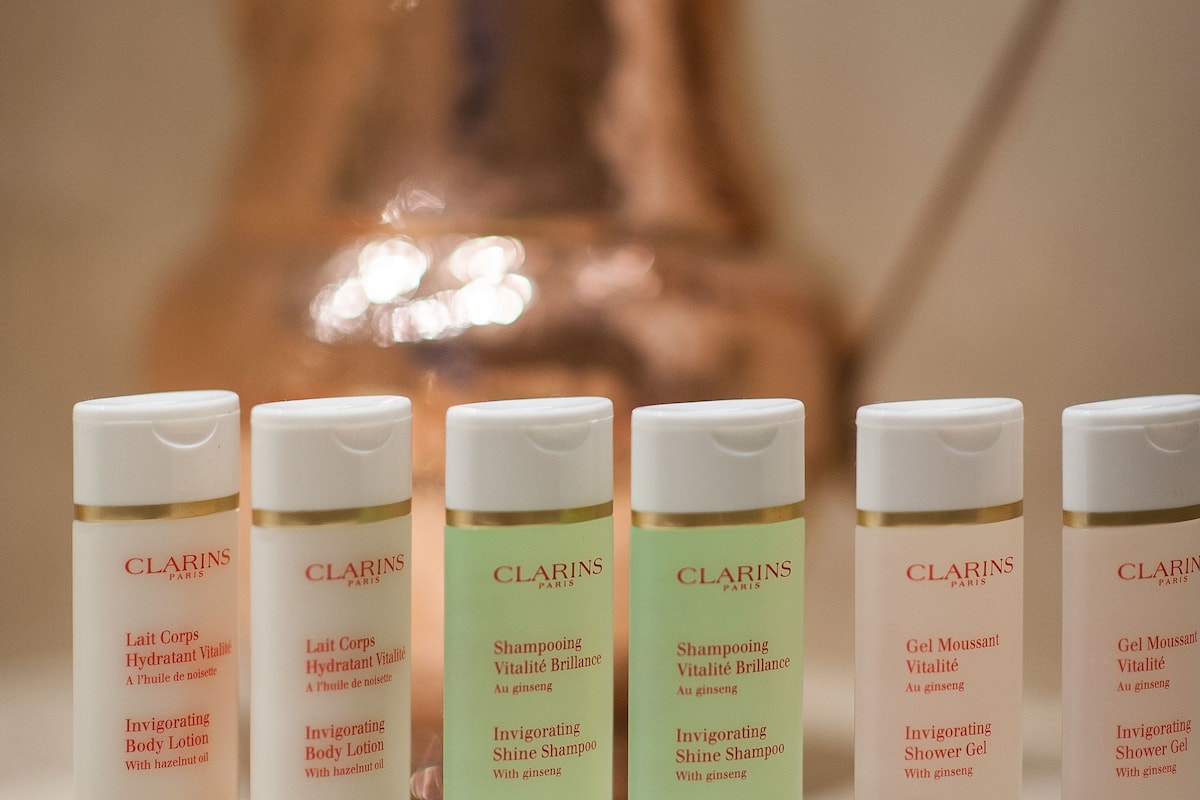 combined shower/bathtub, rainfall showerhead, designer toiletries