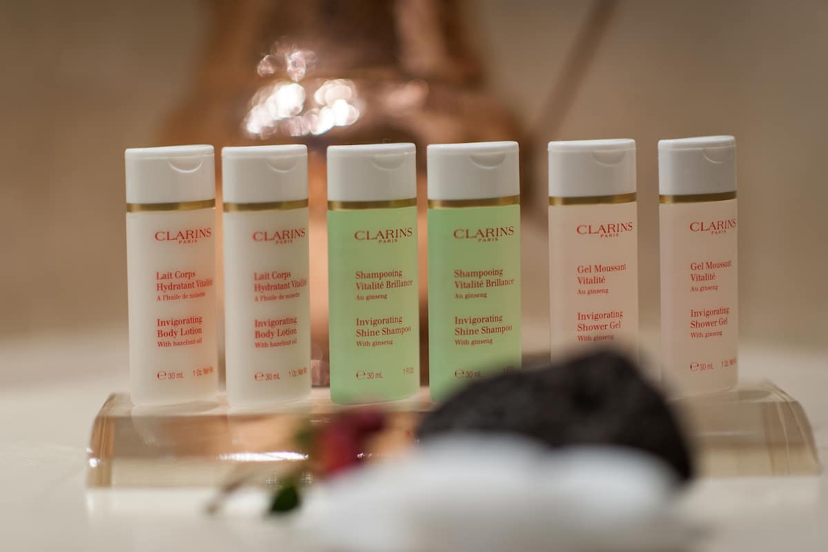 superior room, 1 king bed | bathroom | combined shower/bathtub, rainfall showerhead, designer toiletries