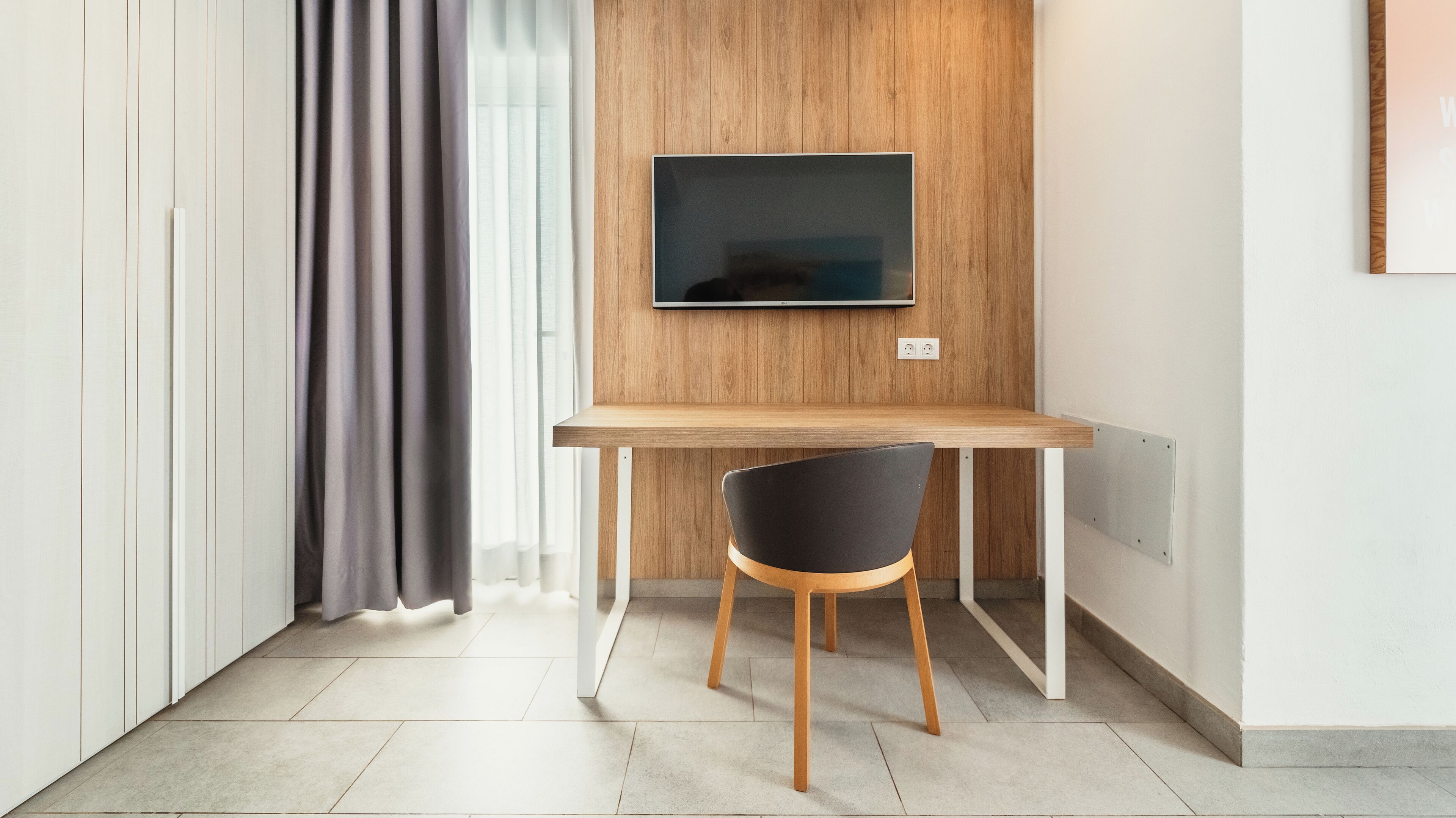 suite, 2 bedrooms (4 adults + 2 children) | living area | flat-screen tv, heated floors