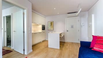 Apartamento, 1 quarto | Cozinha privada | Geladeira grande, micro-ondas, cooktop, lava-louças